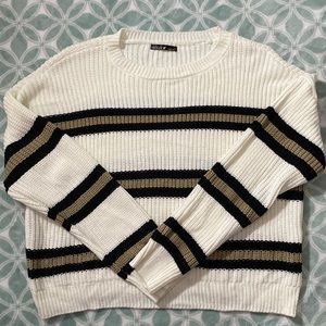 White sweater with black and brown stripes